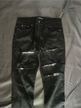 AMIRI Black Distressed Slim Jeans